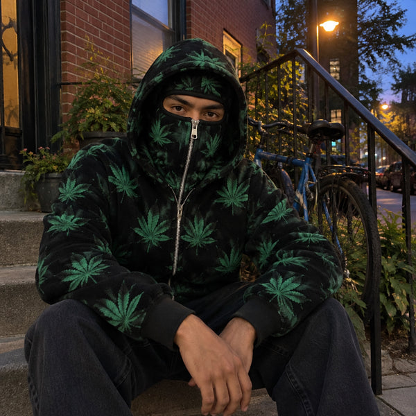 Kush Cloak hoodie green on a stoop